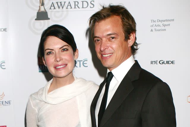 <p>Phillip Massey/FilmMagic</p> Lara Flynn Boyle and husband Donald Ray Thomas in 2007