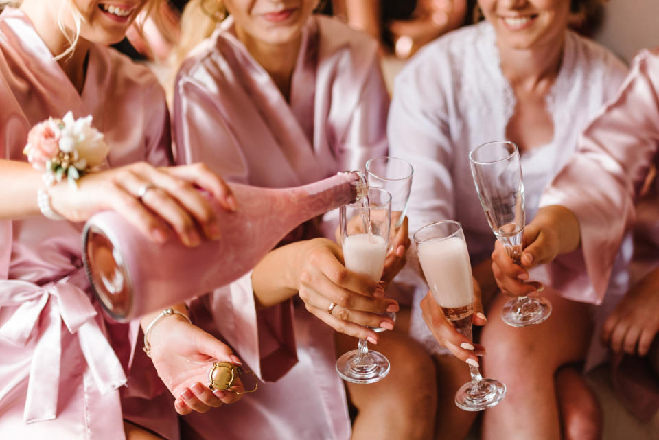 Drinks at the wedding can bump up the cost. (Getty Images)