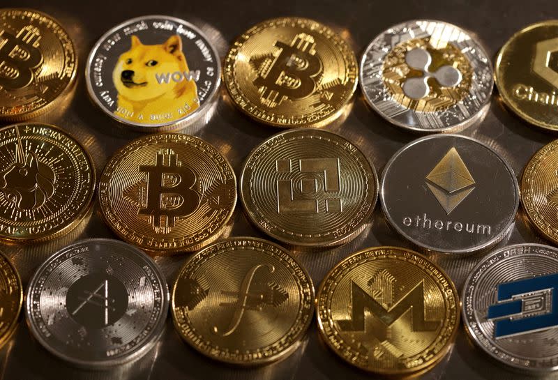 FILE PHOTO: Illustration shows representations of cryptocurrencies