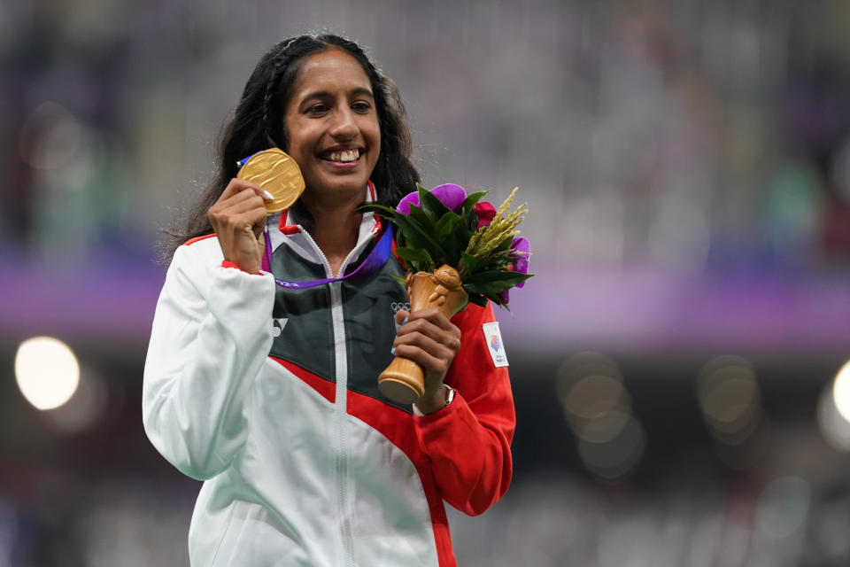 Singapore sprinter Shanti Pereira poses with her women's 200m gold medal at the 2023 Hangzhou Asian Games. (PHOTO: Sport Singapore/ Bryan Foo)