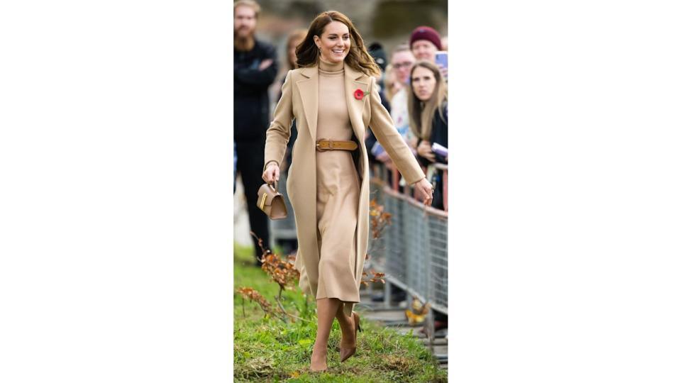 Catherine, Princess of Wales on grass in tan dress and coat