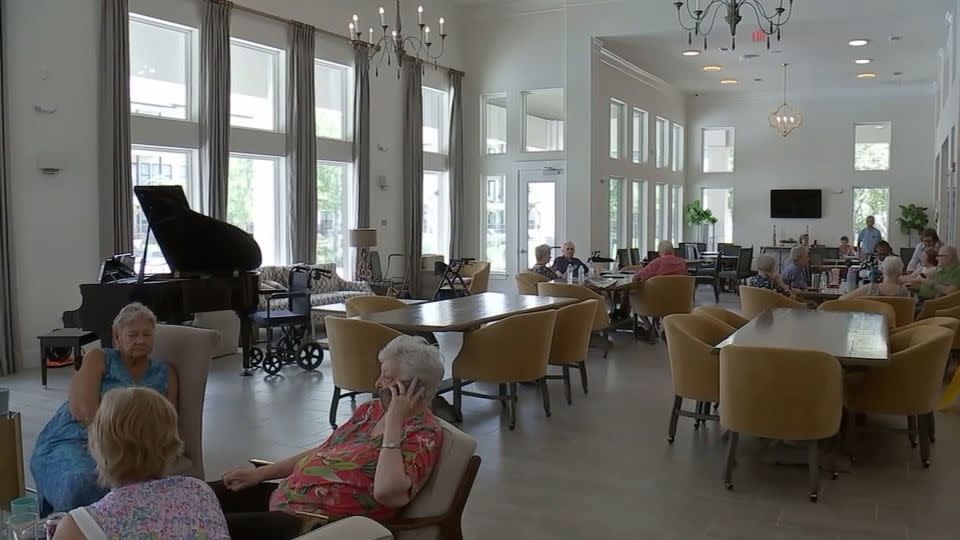 Residents in the generator-powered lounge of an independent living facility in the Kingwood community in Texas. The space became a lifeline for many older residents during the long power outage. - KTRK
