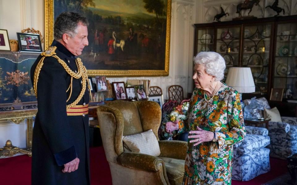 The Queen receives Sir Nick during an audience in the Oak Room at Windsor Castle - PA