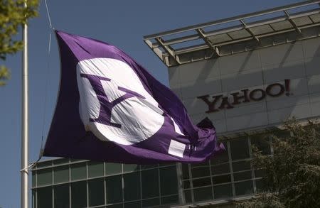 The Yahoo logo is shown at the company's headquarters in Sunnyvale, California April 16, 2013. The company will release its quarterly results on Tuesday. REUTERS/Robert Galbraith