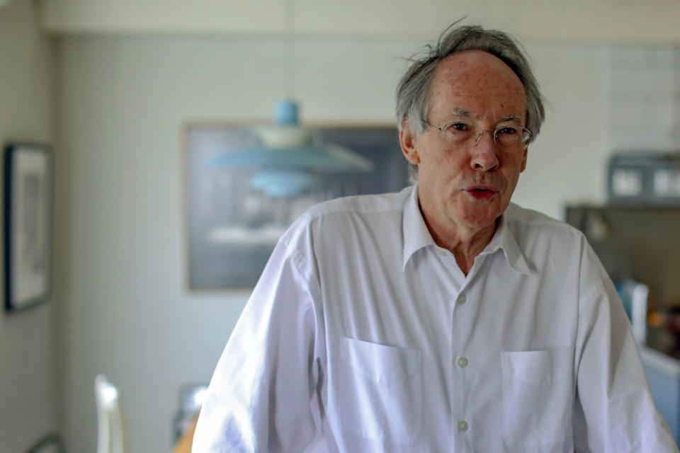 In this photo taken on Thursday, April 18, 2019, Booker Prize award winning English novelist and screenwriter Ian Russell McEwan talks to Associated Press about his new novel "Machines Like Me" in London. McEwan is fascinated by artificial intelligence. A central character in his new novel is a lifelike android with access to all human knowledge who writes haiku poetry. The book, published in the United States Tuesday, April 23 by Doubleday, looks at the messy relationship between human minds and artificial ones. (AP Photo/Vudi Xhymshiti)