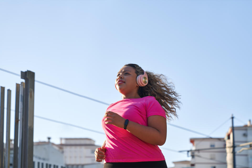 woman running outside during the day