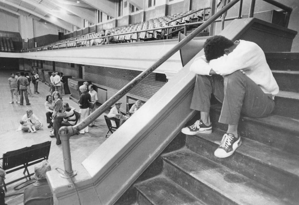 Evacuated residents take shelter at the Akron Armory on June 23, 1977.