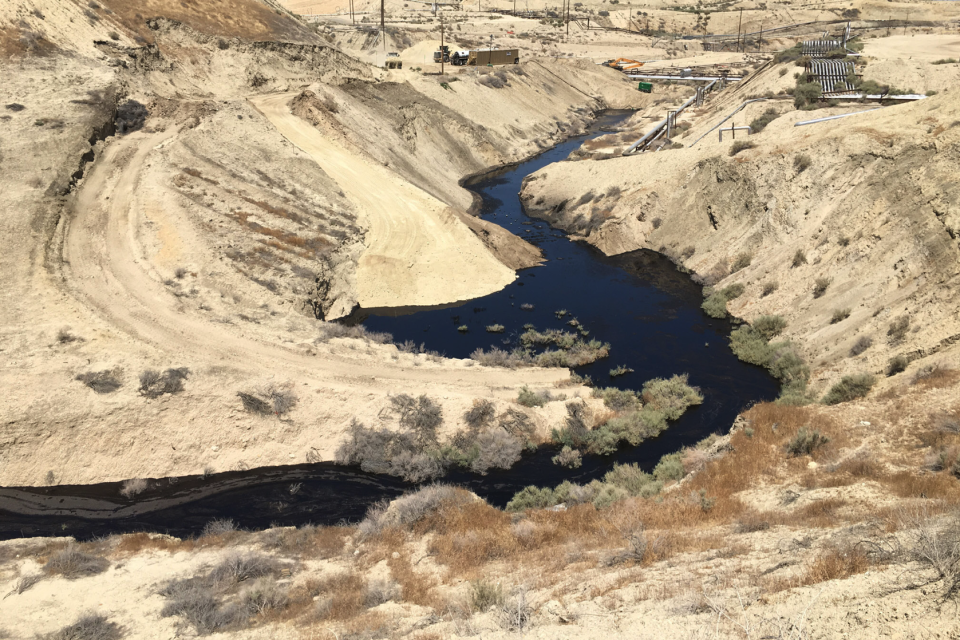 A river of oil spills across the Cymric field near McKittrick, California, in June 2019.