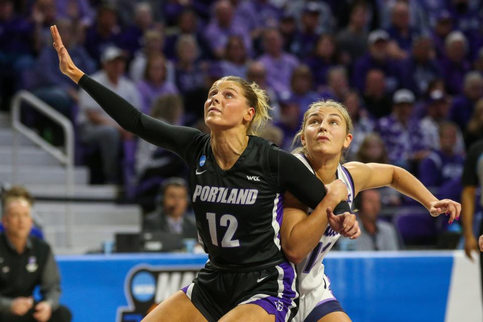 Portland's Kennedy Dickie (12) blocks out Kansas State guard Gabby Gregory during their first-round NCAA Tournament game Friday at Bramlage Coliseum.