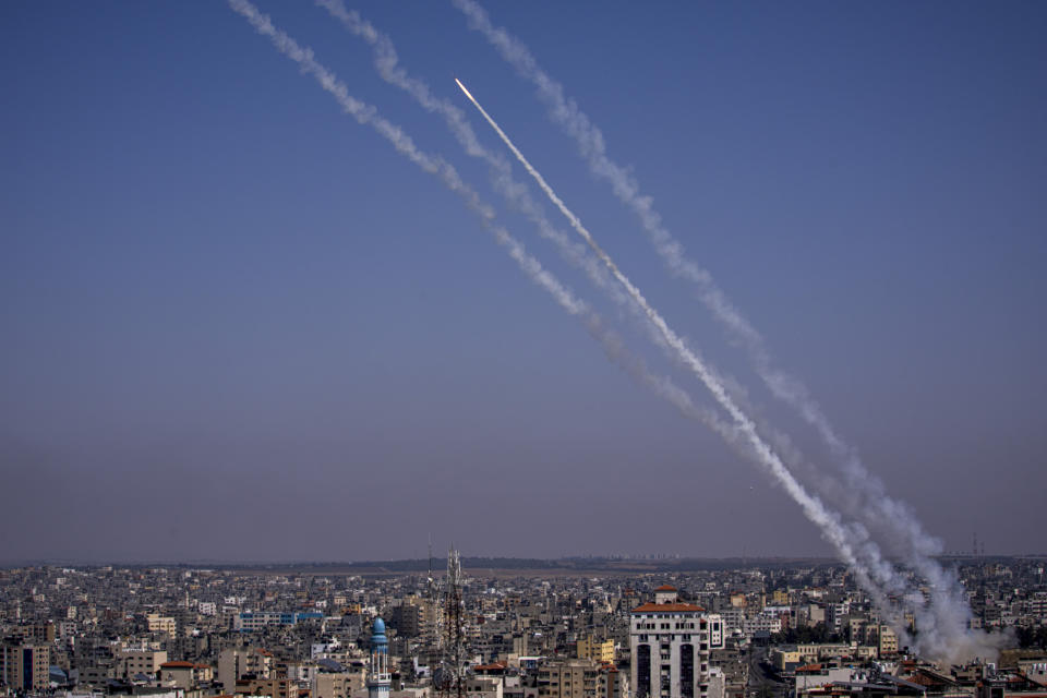 Rockets are launched from the Gaza Strip towards Israel, in Gaza, Wednesday, May 10, 2023. Palestinian militants fired dozens of rockets from the Gaza Strip into Israel on Wednesday, in a first response to Israeli airstrikes that have killed 16 Palestinians, including three senior militants and at least 10 civilians. (AP Photo/Fatima Shbair)