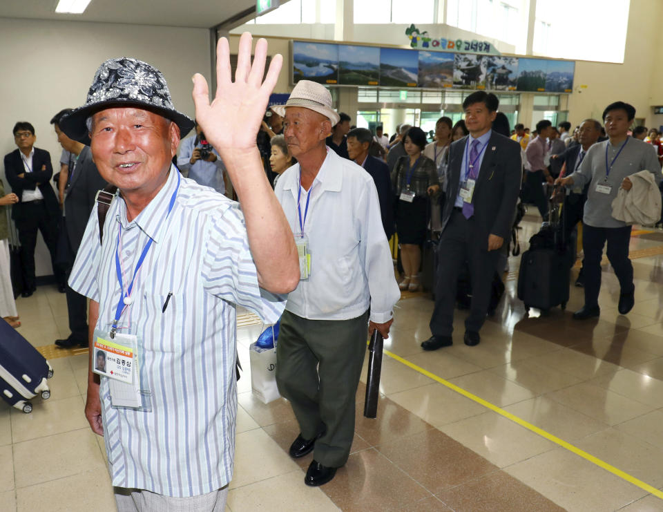 South Koreans leave for North Korea to take part in family reunions with their North Korean family members at the customs, immigration and quarantine (CIQ) office, in Goseong, South Korea, Monday, Aug. 20, 2018. About 200 South Koreans and their family members prepared to cross into North Korea on Monday for heart-wrenching meetings with relatives most haven't seen since they were separated by the turmoil of the Korean War. (Korea Pool/Yonhap via AP)