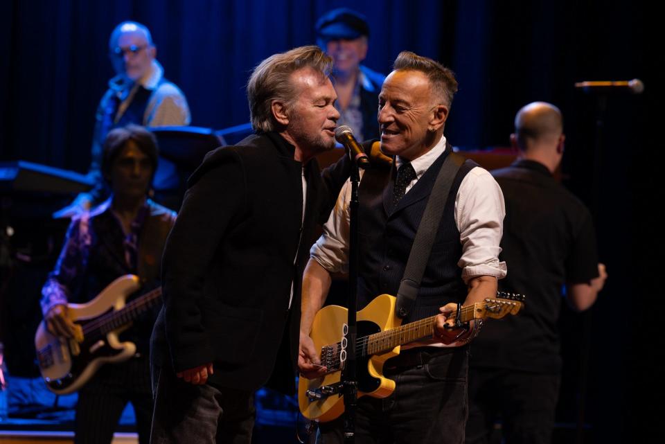 John Mellencamp (left) and Bruce Springsteen perform April 24 at the American Music Honors presented by the Bruce Springsteen Archives and Center for American Music at Monmouth University.