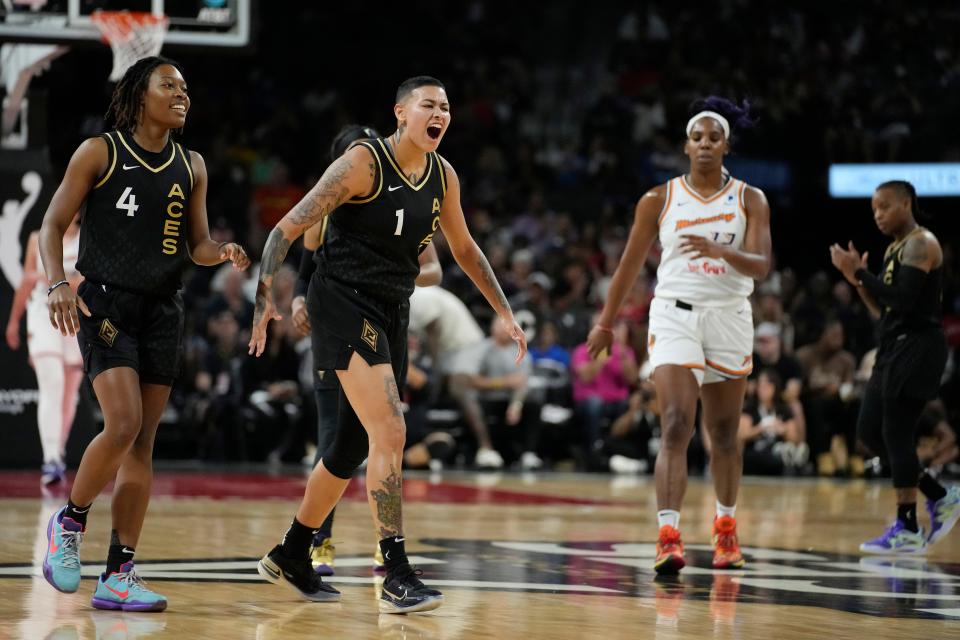Aces guard Kierstan Bell (1) celebrates after a play against the Phoenix Mercury during the second half in Game 2 of a WNBA first-round playoff series, Saturday, Aug. 20, 2022, in Las Vegas.