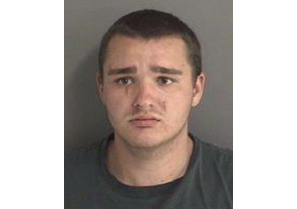 This booking photo provided by the Story County (Iowa) Jail shows Collin Daniel Richards. Richards has been charged in the killing of Celia Barquin Arozamena, a former champion golfer from Spain, after her body was found Monday, Sept. 17, 2018, at a golf course in Ames, Iowa. (Story County (Iowa) Jail via AP)