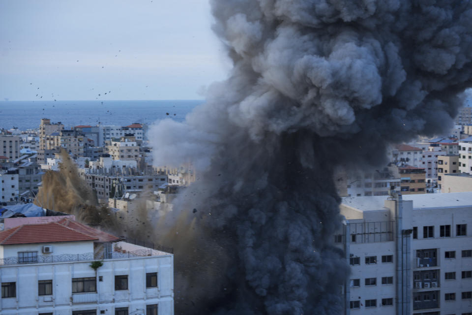 Smoke rises following an Israeli airstrike, in Gaza City, Sunday, Oct. 8, 2023. The militant Hamas rulers of the Gaza Strip carried out an unprecedented, multi-front attack on Israel at daybreak Saturday, firing thousands of rockets as dozens of Hamas fighters infiltrated the heavily fortified border in several locations, killing hundreds and taking captives. Palestinian health officials reported scores of deaths from Israeli airstrikes in Gaza. (AP Photo/Hatem Moussa)