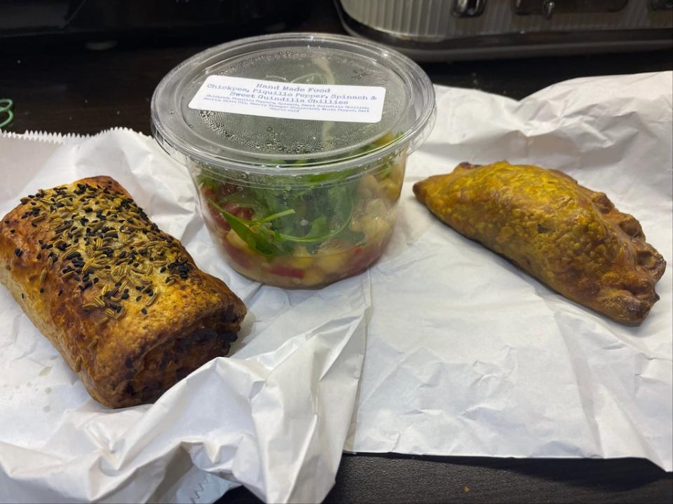 A vegetarian sausage roll, chickpea salad, and a pasty rescued for just £3.50 using Too Good To Go (Kate Ng)