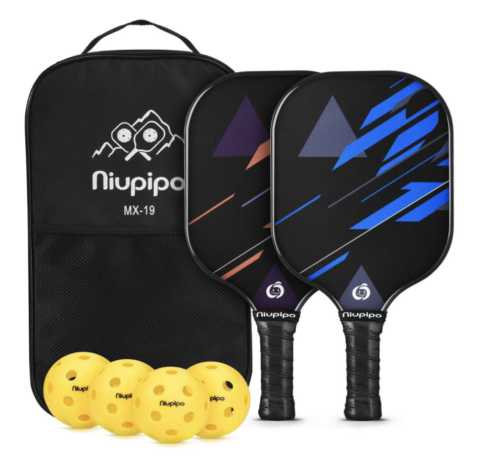 Pickleball Paddle Set of 2 paddles with four yellow balls and a black carrying case (Photo via Amazon)