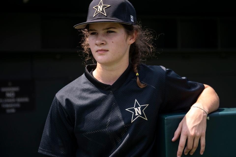 Nolensville LL pitcher, Stella Weaver, looks out from the dugout during her team’s practice at Hawkins Field at Vanderbilt in Nashville , Tenn., Monday, July 17, 2023.
