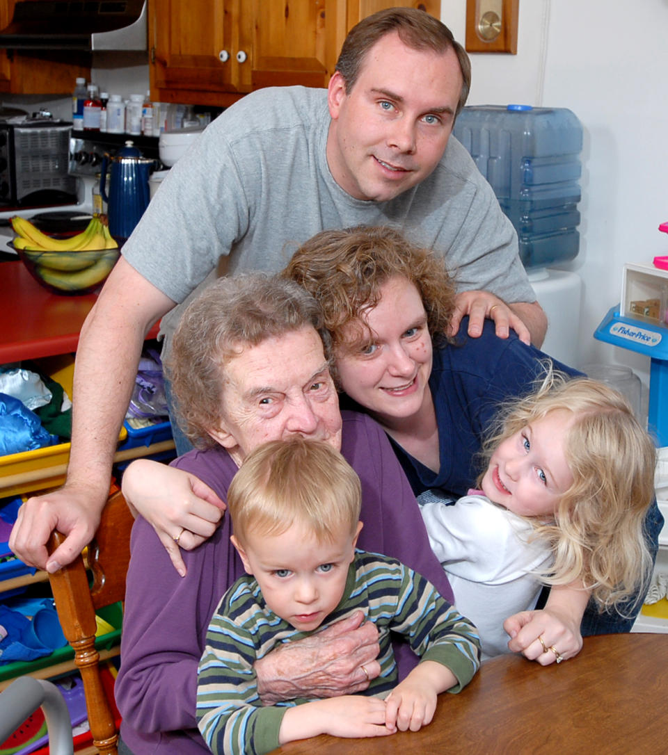 Gordon Chibroski/Staff PhotograpHer. Friday, May 04, 2007. Features of Jennifer Mallett and family preparing diner for Maine Life Centerpiece on the "Sandwich Generation." Other members of family are husband, Jim, son Luke, 2, daughter Autumn, 4, and Jennifer's grandmother, Jean, 93. Here, the Mallett family give each other a good hug after dinner. (Photo by Gordon Chibroski/Portland Press Herald via Getty Images)