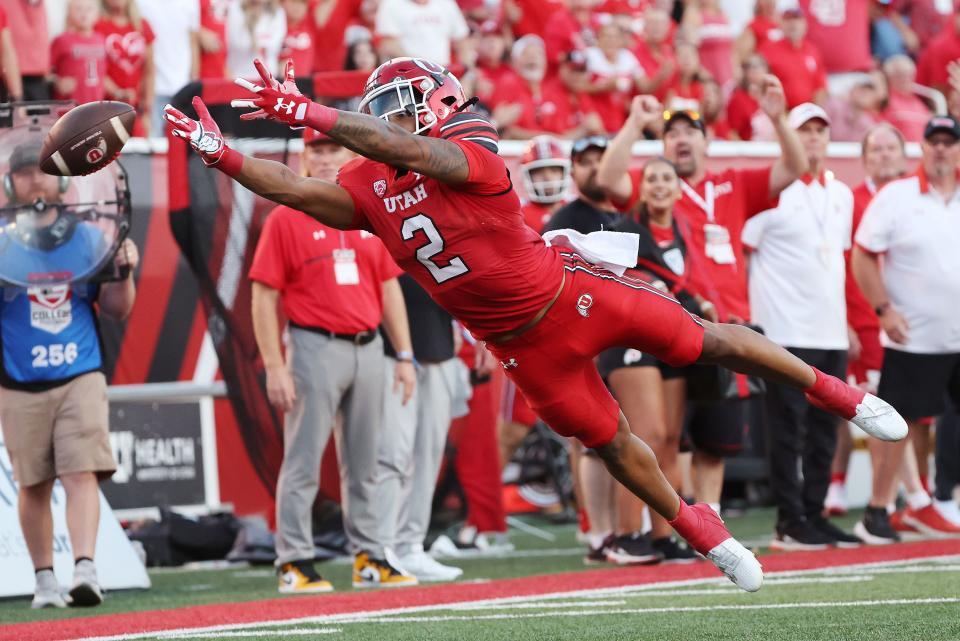 Utah Utes running back Micah Bernard (2) dives for a pass in Salt Lake City on Thursday, Aug. 31, 2023 during the season opener. | Jeffrey D. Allred, Deseret News