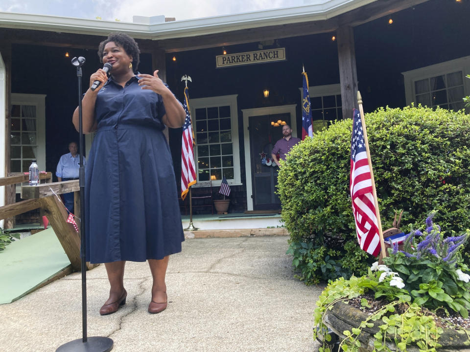 FILE - Georgia Democratic candidate for governor Stacey Abrams speaks on July 28, 2022, during a rally in the north Georgia mountain town of Clayton. Although Republicans increasingly rely on voters in north Georgia areas including Clayon as their margins shrink in suburban Atlanta, Abrams aims to boost Democratic turnout in those areas, hoping additional votes will aid her and other Democrats in statewide elections, even if Democrats remain in the deep minority in north Georgia (AP Photo/Jeff Amy)