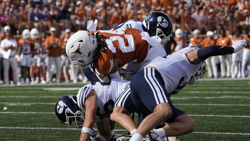 Texas running back Jonathon Brooks (24) lunges for a touchdown during the first half of an NCAA college football game against BYU in Austin, Texas, Saturday, Oct. 28, 2023.