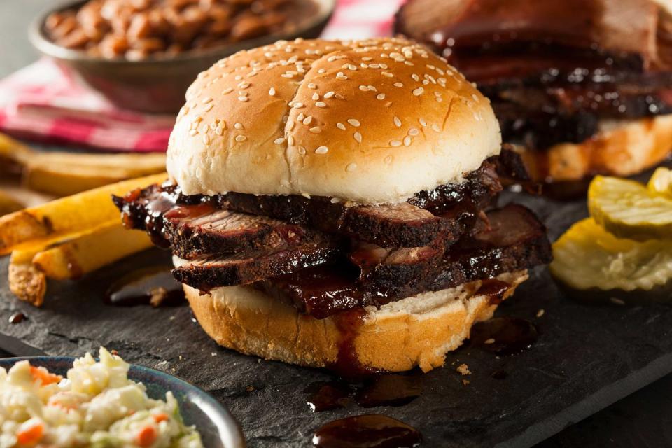 <p><strong>Barbecue Brisket</strong></p><p>Of course Texas would be known for the Barbecue Brisket. Served on a roll or toast, chopped or sliced barbecue beef is hard to miss in Texas. They’re slow-smoked for hours (12-18 to be exact) with fixings that include pickles, onions and jalapeño peppers. Try it at <a href="https://tylersbarbeque.com/" rel="nofollow noopener" target="_blank" data-ylk="slk:Tyler’s Barbeque;elm:context_link;itc:0;sec:content-canvas" class="link ">Tyler’s Barbeque</a>. </p>