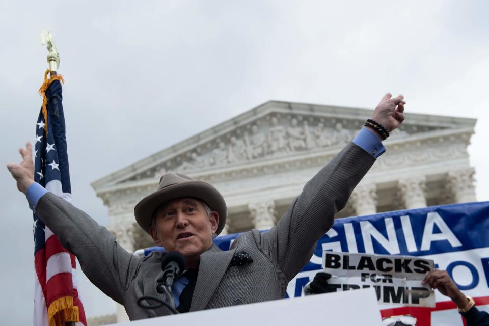 Roger Stone speaks to supporters of President Donald Trump outside the Supreme Court on Jan. 5, 2021, in Washington as they protest the congressional certification of the Electoral College vote. Stone was pardoned in December 2020 after being convicted of seven felonies, including lying under oath.