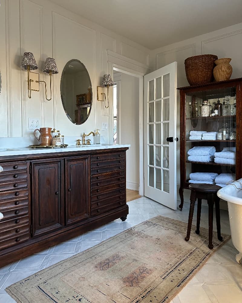 Wooden vanity in newly renovated bathroom.