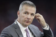 FILE - Former Ohio State head coach Urban Meyer watches during the second half of the Big Ten championship NCAA college football game between Ohio State and Wisconsin in Indianapolis, in this Saturday, Dec. 7, 2019, file photo. Jacksonville’s draft prospects helped lure Urban Meyer out of coaching retirement. The No. 1 choice, an opportunity to grab Clemson star Trevor Lawrence and secure a franchise quarterback for the foreseeable future. (AP Photo/Michael Conroy, File)