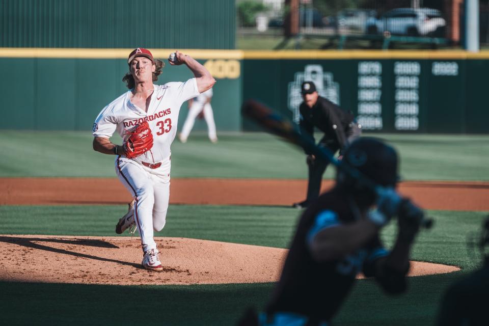 Arkansas baseball's Hagen Smith fires a pitch during the Razorbacks' 7-5 win over Mississippi State Friday, May 10, 2024.