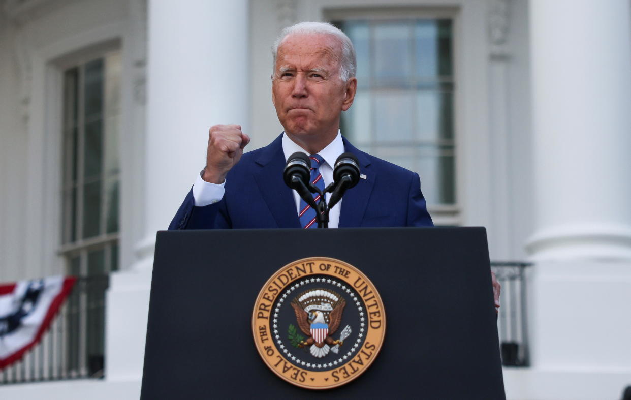 President Biden gestures as he delivers remarks at the White House on Independence Day 2021. 