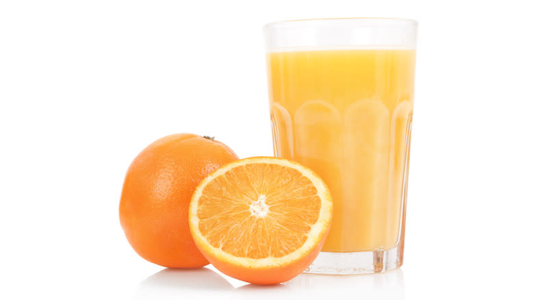 Fresh orange juice with oranges