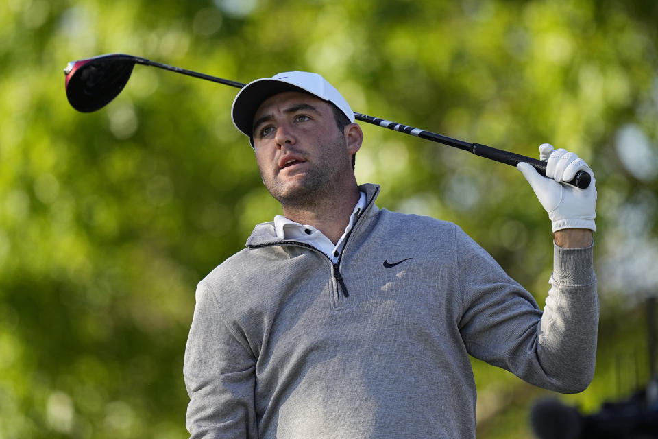 Scottie Scheffler reacts to his drive on the sixth hole during a round of 16 at the Dell Technologies Match Play Championship golf tournament in Austin, Texas, Saturday, March 25, 2023. (AP Photo/Eric Gay)