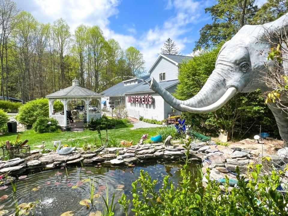 The gardens at Mister Ed’s Elephant Museum and Candy Emporium feature seven “life size” elephants.