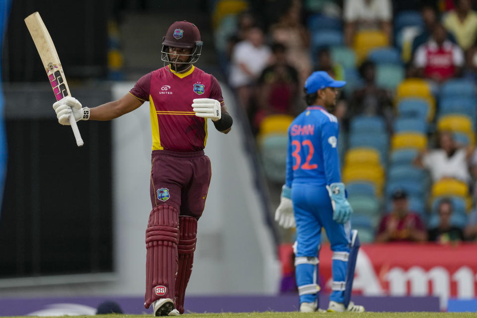 West Indies' captain Shai Hope celebrates scoring half a century against India during the second ODI cricket match at Kensington Oval in Bridgetown, Barbados, Saturday, July 29, 2023. (AP Photo/Ricardo Mazalan)