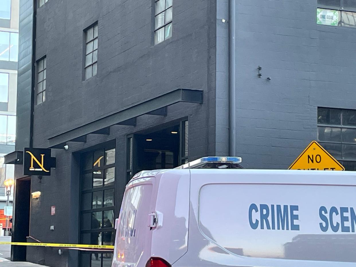 A Columbus Division of Police crime scene search unit van sits parked outside Noir Lounge in the 10 block of West Cherry Street in Downtown Columbus. Two people were found shot to death outside the bar early Monday, Feb. 5, 2024.