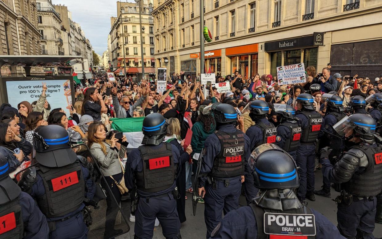 People attend a pro-Palestine rally in Republique Square, Paris