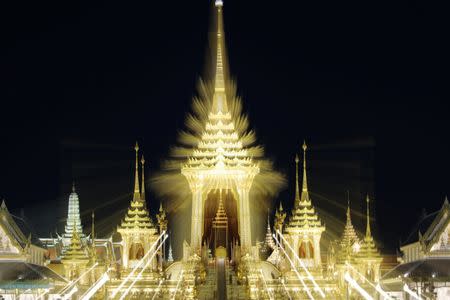 The Royal Crematorium site for the late King Bhumibol Adulyadej is seen near the Grand Palace in Bangkok, Thailand October 20, 2017. Zoomed image is taken with slow shutter speed. Picture taken October 20, 2017. REUTERS/Athit Perawongmetha