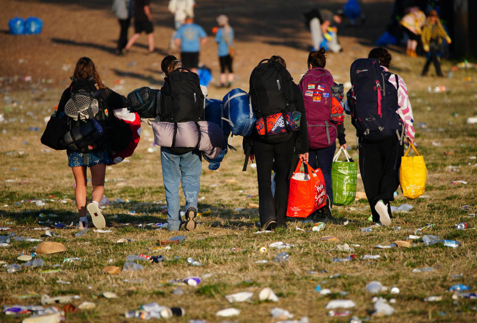 Festival-goers leaving at the end of Glastonbury Festival 2024