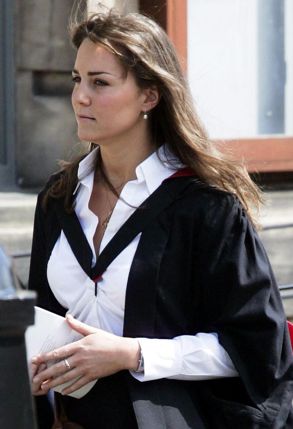 <p>Kate Middleton wore the rose gold and pearl ring Prince William gave her to her June 2005 graduation from St. Andrew's University, where the pair first met. </p><p><strong>More</strong>: <a href="https://www.townandcountrymag.com/society/tradition/a35770428/kate-middleton-prince-william-relationship-full-timeline/" rel="nofollow noopener" target="_blank" data-ylk="slk:Prince William and Kate Middleton's Relationship Timeline;elm:context_link;itc:0;sec:content-canvas" class="link ">Prince William and Kate Middleton's Relationship Timeline</a></p>