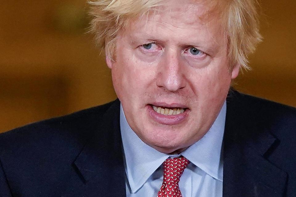 Boris Johnson has stuck by his chief advisor (10 Downing Street/AFP via Getty)