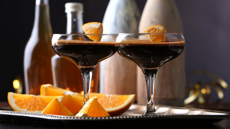 chocolate martinis with orange wedges