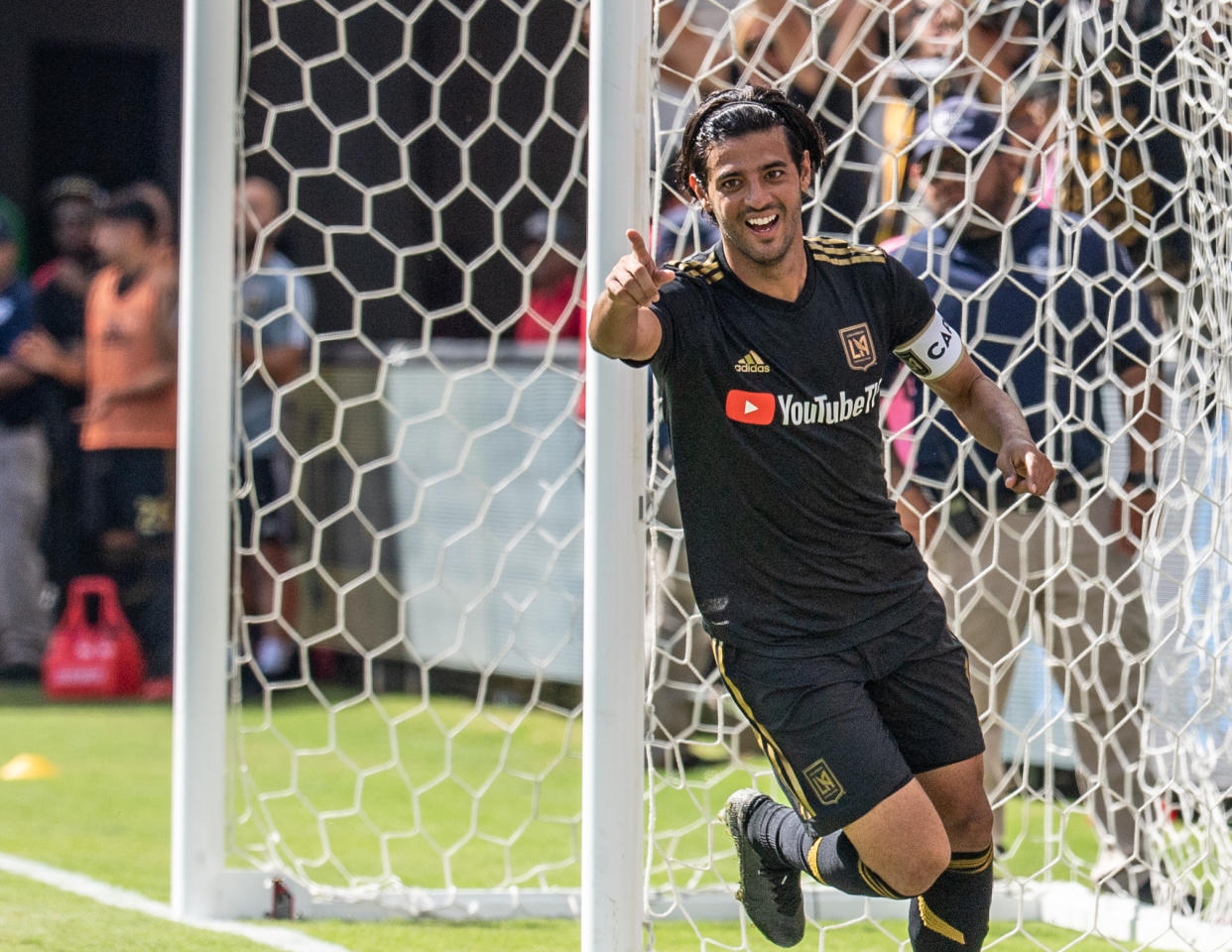 LOS ANGELES, CA - OCTOBER 6: Carlos Vela #10 of Los Angeles FC celebrates his 3rd goal during Los Angeles FC's MLS match against Sporting Kansas City at the Banc of California Stadium on October 6, 2019 in Los Angeles, California. Los Angeles FC won the match 3-1 (Photo by Shaun Clark/Getty Images)