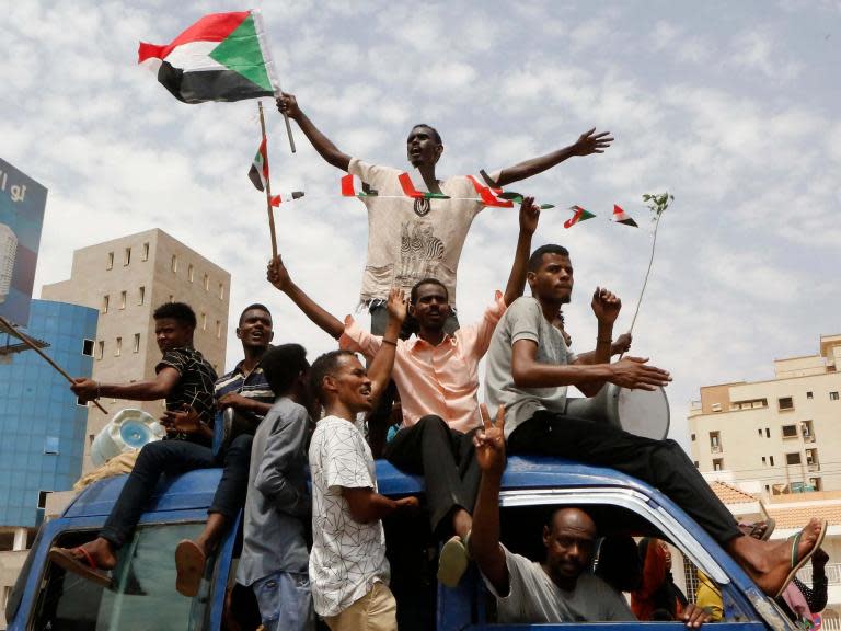 Sudan’s opposition and ruling military junta agreed to a political power-sharing deal early on Friday morning, designed to end months of political unrest that toppled the country’s longtime dictator and left scores of civilians dead.Word of the deal sparked celebrations in the capital, Khartoum.“It is a turning point that will usher in a new dawn in the country,” opposition Sudanese Congress Party leader Omar al-Degair was quoted as saying by state radio. Under the terms of the deal, Sudan’s Transitional Military Council and the opposition Freedom and Change will contribute equally to a 10-person council that will rule over the country, with each side rotating in the leadership for three years or longer before the end of elections. They also agreed to a joint investigation of the 3 June massacre of peaceful opposition protesters at the hands of shadowy pro-regime militiamen.Lawyers for the two sides are writing up the agreement, which will be signed by both sides a few days after it is complete, Siddig Yousif, one of the civilian negotiators, told BBC World Service. “This is the first step for building a democratic Sudan,” he said. The deal, brokered by the African Union, leaves a fragmented military backed by regional Arab dictatorships firmly entrenched. But it also dissolves the Transitional Military Council that has been in charge since the toppling of longtime ruler Omar al-Bashir, a military man. It comes after nearly eight months of protests that began in a rural enclave over bread price rises and culminated in a vast, peaceful movement led by a network of Sudanese lawyers, doctors, engineers and educators. Sudan has struggled to throw off the yoke of military rulers for decades. But civilian-led administrations were quickly toppled by the armed forces, who have dragged the country into repeated and disastrous civil wars. Mr Bashir’s militarism cost the country its oil-rich south, which broke away and became the Republic of South Sudan in 2011. The country’s ongoing civil wars in the Darfur region and elsewhere make it one of the largest producers of refugees in the world. Mr Yousif acknowledged to the BBC that opposition leaders would have to convince hundreds of thousands of activists and protesters that the deal is worthwhile. They defiantly flooded the streets of Khartoum on 30 June in a mass protest against the military, despite the threat of violence by pro-regime gunmen and a clampdown on the internet. The deal falls short of the demand for an end to the pervasive power of the military rule demanded by opposition activists and ordinary Sudanese. It appears to keep the leader of the junta, a onetime militia commander named Abdel Fattah al-Burhan, firmly in charge of the security apparatuses, which could easily reverse any democratic gains. The security forces have refused to lift internet restrictions or release hundreds of political prisoners held in jail. The military will assume leadership of Sudan for the first half of the transition period, yielding power to civilians under the deal after 21 months.Some are sceptical that Sudan’s armed forces would ever give up the reins of power, or that armed forces’ Egyptian, Saudi, and Emirati patrons would ever allow a civilian-led democratic Arab government to flower on the Red Sea. “It’s open to question whether the military is ever going to step down,” Joseph Siegle, director of research at the Washington-based Africa Center for Strategic Studies, told The Independent.“It’s very consistent with Sudanese politics to make promises and concessions and appear moderate at one point, and then as time passes, to renege on that.”But the deal may be the best the civilian activists can hope for. The military, which provides Saudi Arabia and the United Arab Emirates with ground forces for their four-year war against Iranian-backed Houthis in Yemen, has the firm financial and diplomatic support of the Gulf monarchies as well as the dictatorship in neighbouring Egypt.In a surprise move, the US vocally called out the meddling by its Gulf allies in Sudan. That, along with African Union pressure on Mr Burhan, may have prompted the military to compromise. The country is also in dire economic straits, with foreign debt at $55bn, inflation running at over 70 per cent, and food and fuel prices tripling in recent months. “Since the beginning there are all these fundamental problems that had sparked the protests to begin with,” said Mr Siegle. “The military is not a position to solve them.”The deal may also provide some breathing space for the civilian protest movement to continue protests and demand further reform, H.A. Hellyer, a Middle East and north Africa specialist at the Atlantic Council and the Royal United Services Institute, told The Independent. “The deal is not what many in the protest movement will have hoped for, while there will also be those who consider it the least bad of all options,” he said. Mr Yousif admitted that the deal was a gamble. “We think this will pave the way for an end to military rule in Sudan,” he said, expressing a cautious optimism.