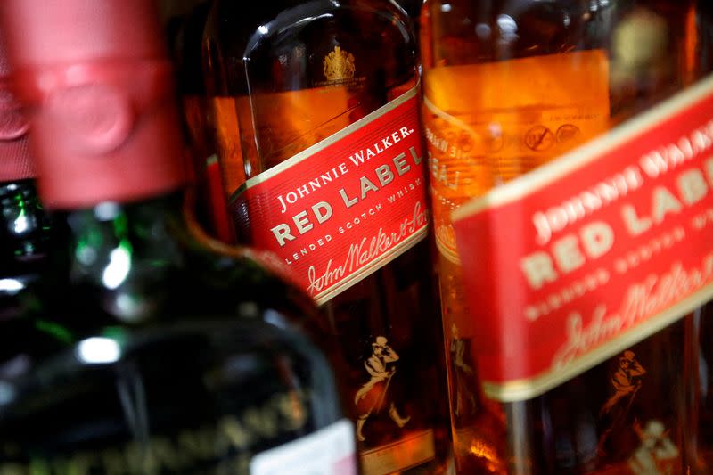 FILE PHOTO: Bottles of Diageo's Johnnie Walker and Buchanan's whiskies