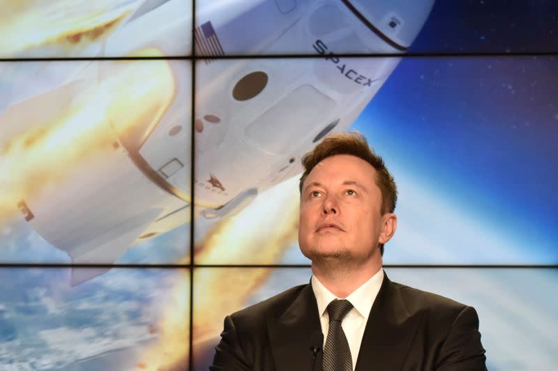 SpaceX founder and chief engineer Elon Musk attends a post-launch news conference to discuss the SpaceX Crew Dragon astronaut capsule in-flight abort test at the Kennedy Space Center