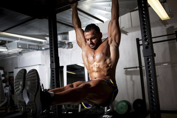 Burn away your belly fat with hanging leg raises!