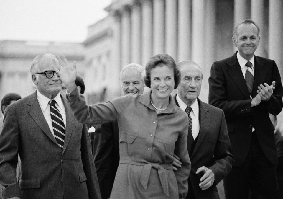 PHOTO: Sandra Day O'Connor waves as she arrives at the U.S. Capitol in Washington in Sept. 1981, shortly after her nomination to the Supreme Court was confirmed by the Senate. (Scott Applewhite/AP, FILE)