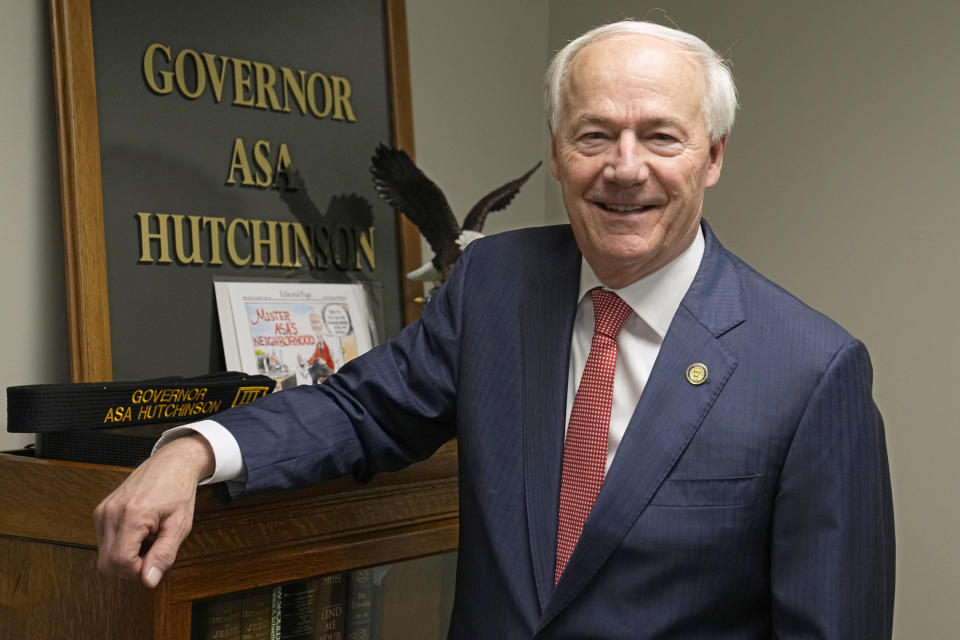 Former Arkansas Gov. Asa Hutchinson poses for a photo in his office Wednesday, April 19, 2023, in Rogers, Ark. (AP Photo/Sue Ogrocki)